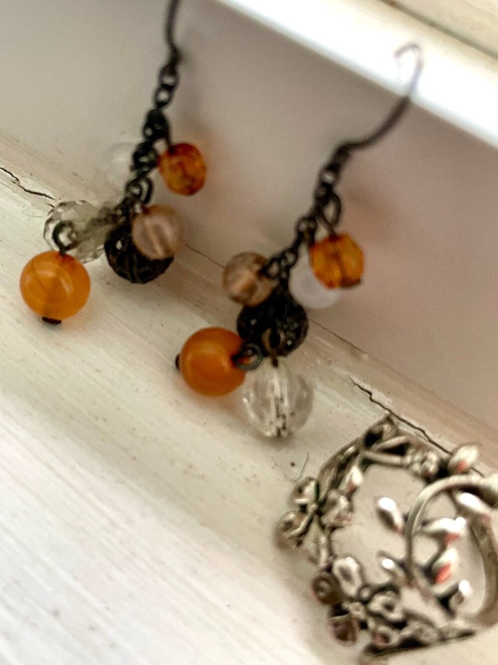 Ring and dangly ball earrings